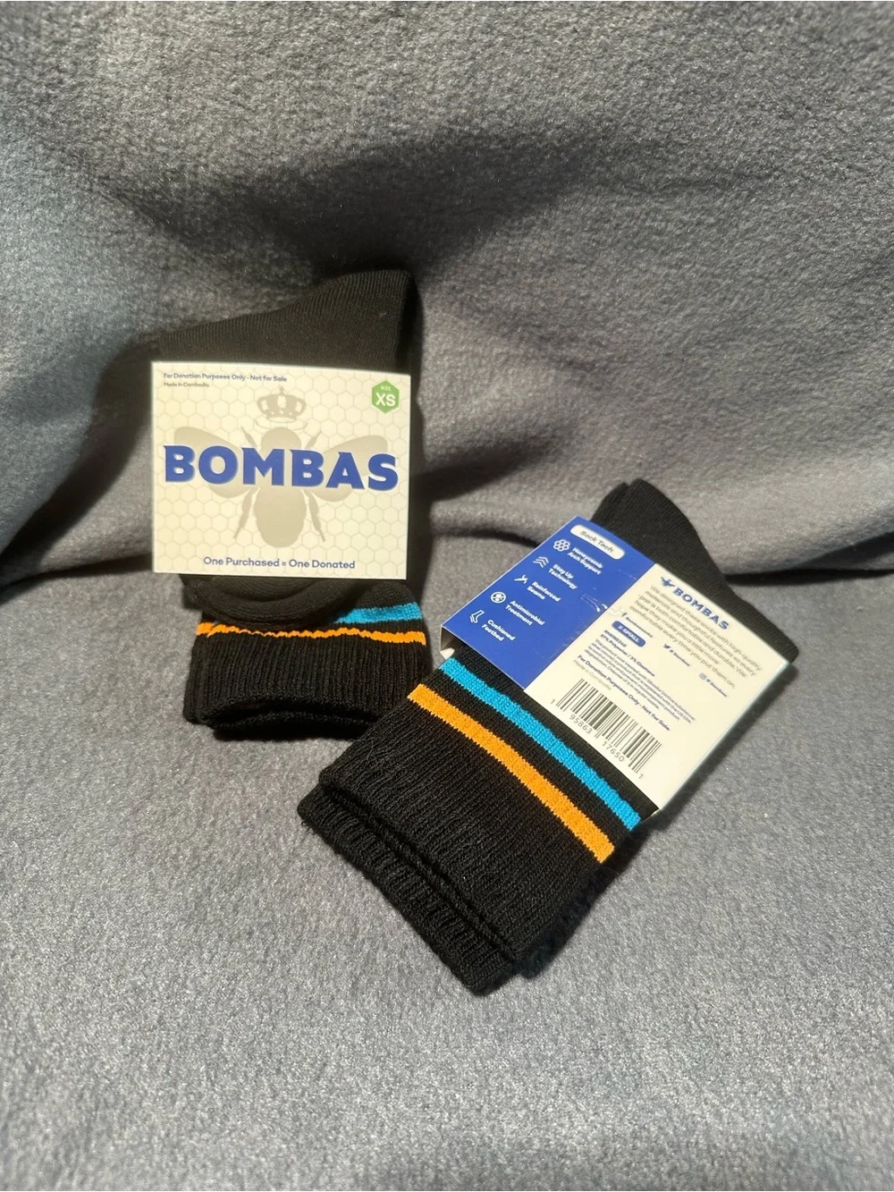 Bombas Black Crew Socks with Blue and Orange Stripe Accents